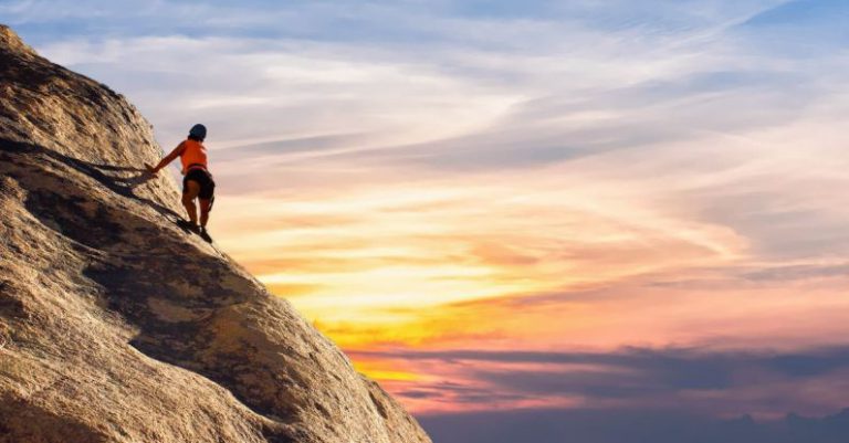 Motivation Mountain - Person Climbing on Mountain