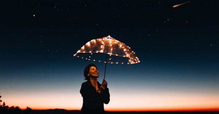 Smile Stars - Woman Using Umbrella With Lights