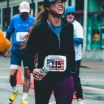 Race Finish - People Standing on Road Beside Building