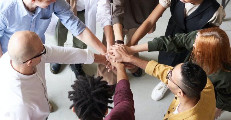 Hands Unity - Photo Of People Holding Each Other's Hands