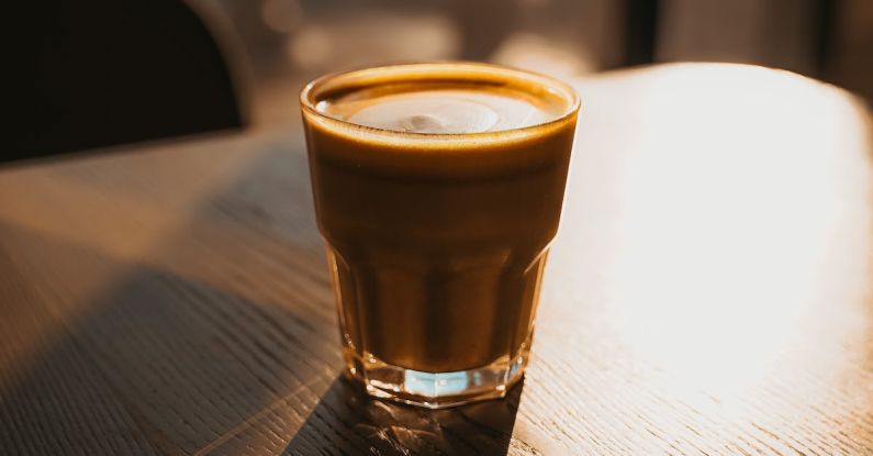 Sunrise Coffee - Close-Up Photo of Coffee On Table